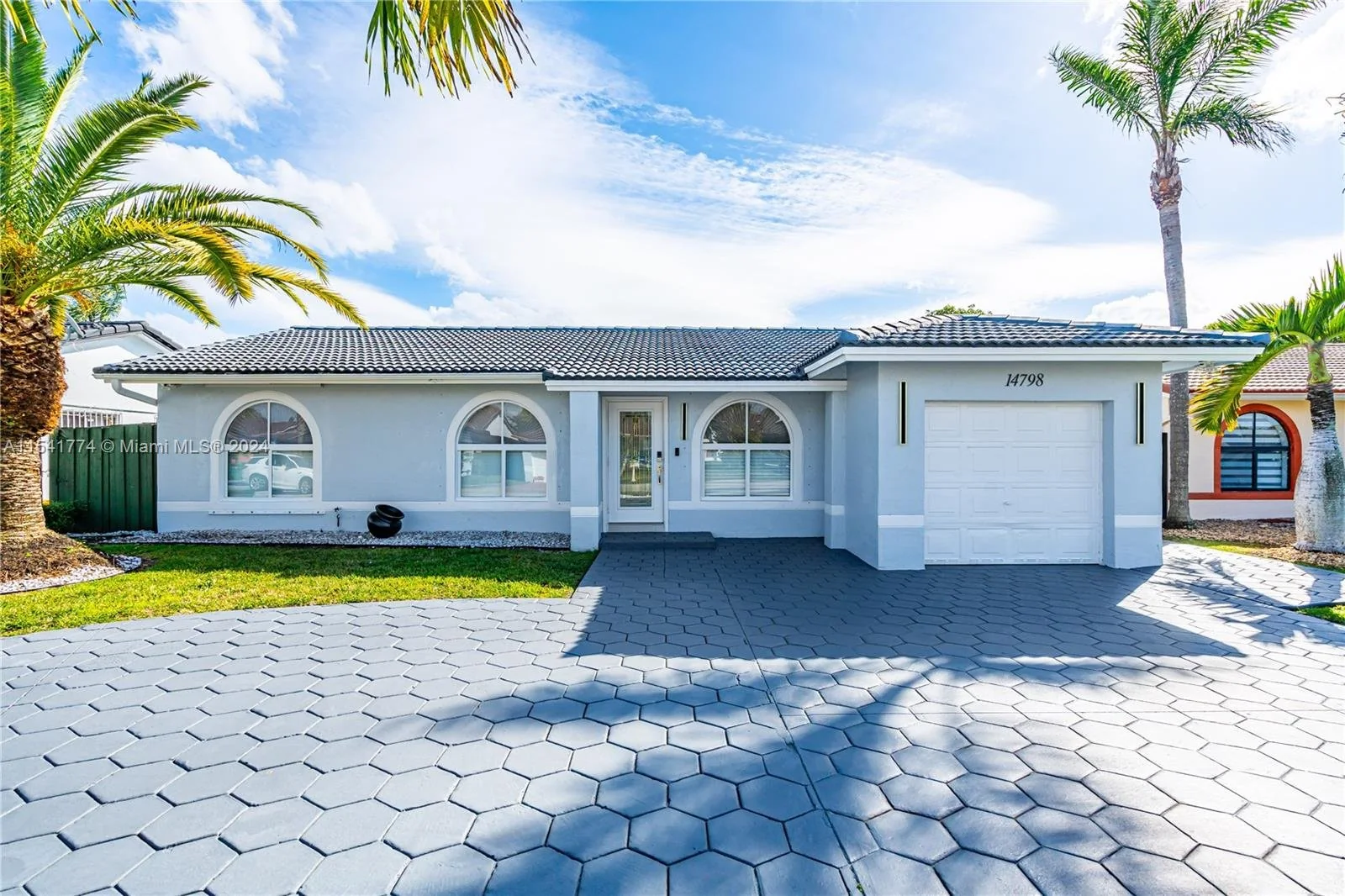 Richmond West home with palm trees