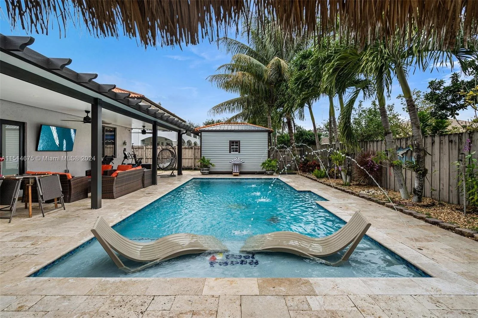Screened swimming pool at a Richmond West home