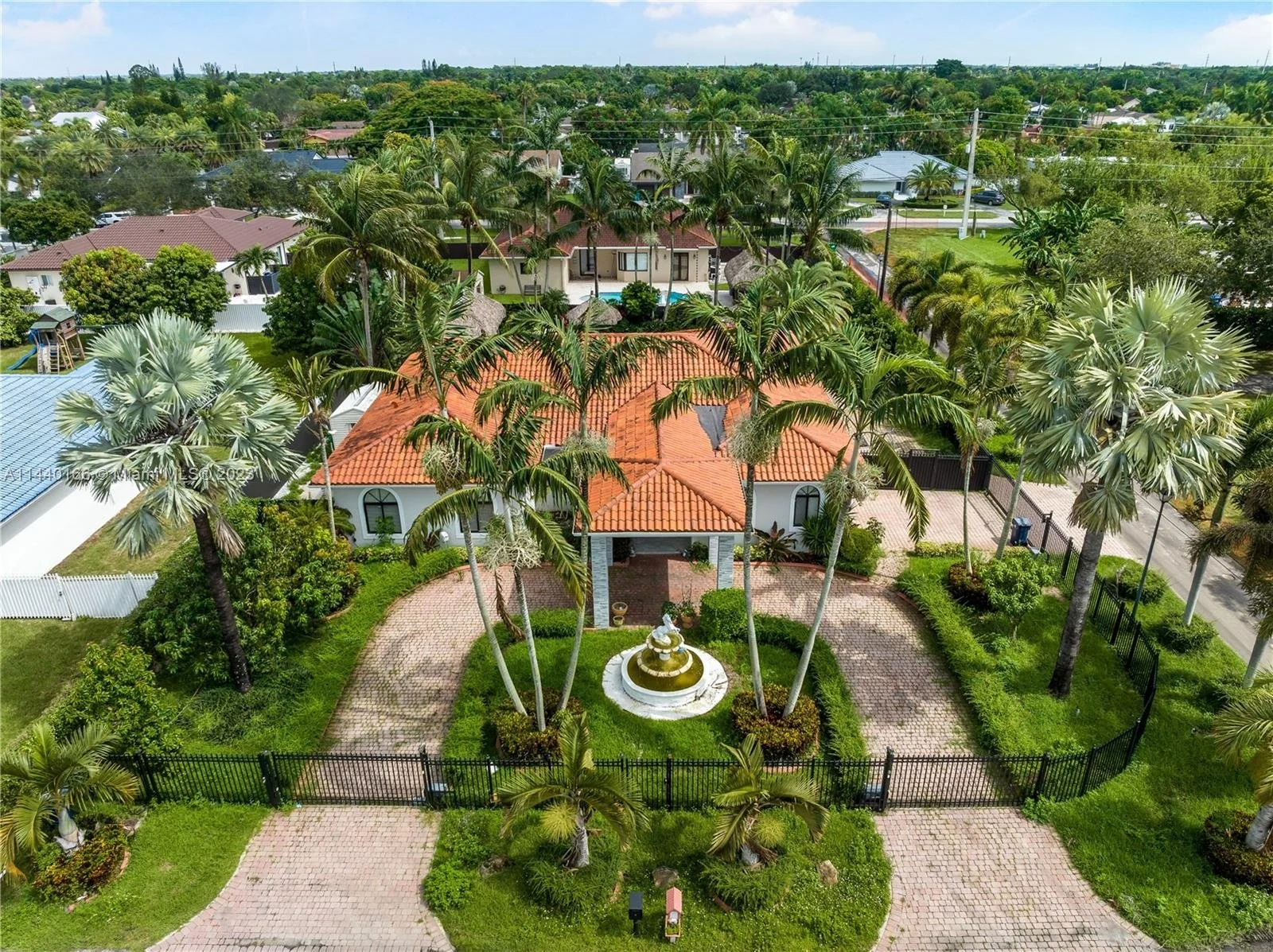 Aerial view of a Richmond West home and pool