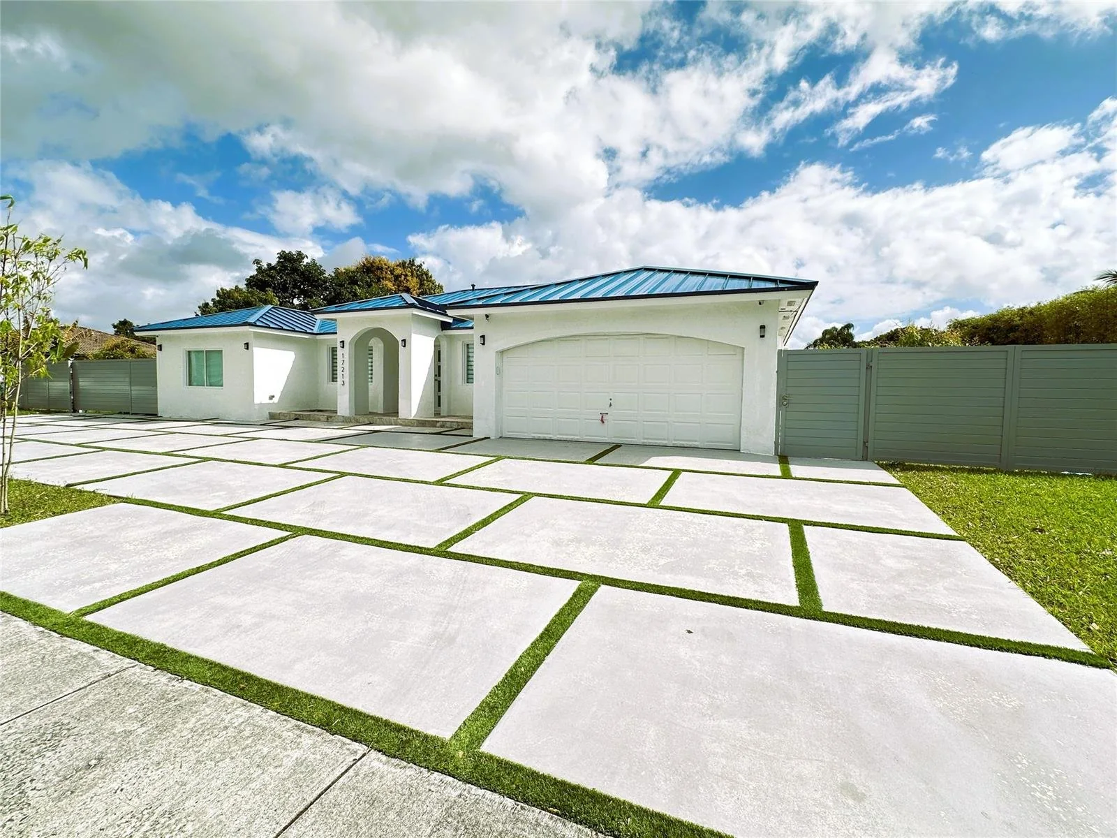 Richmond West home with a large driveway